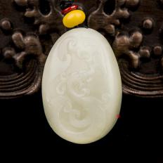 新疆和田玉黃皮白玉籽玉掛件 祥龍 30克
